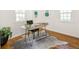 Office with hardwood floors and decorative rug at 3755 S Sherman St, Englewood, CO 80113
