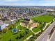 Aerial view of community park with playground, picnic pavilion, and open green space at 1181 W 170 Th Ave, Broomfield, CO 80023