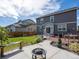 Landscaped backyard features a fire pit, patio, deck, and green lawn area at 1181 W 170 Th Ave, Broomfield, CO 80023