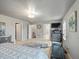 Bright bedroom featuring a ceiling light, large windows and an open layout at 1181 W 170 Th Ave, Broomfield, CO 80023