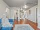 Open hallway boasting hardwood floors and neutral walls at 1181 W 170 Th Ave, Broomfield, CO 80023