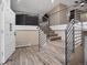 An attractive staircase connects the floors of this home at 8233 W 62Nd Pl, Arvada, CO 80004