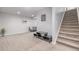 Finished basement featuring carpeted floors and stairs, recessed lighting and an egress window at 2905 S Deframe Way, Lakewood, CO 80228