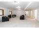 Spacious finished basement area with plush carpeting at 1660 Old Antlers Way, Monument, CO 80132