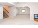 Spacious basement with neutral carpet and ample lighting at 1660 Old Antlers Way, Monument, CO 80132