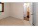Bedroom with neutral carpet and an en suite bathroom at 1660 Old Antlers Way, Monument, CO 80132