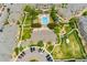 Aerial image of a community featuring an outdoor pool and manicured lawns at 7440 S Blackhawk St # 7-303, Englewood, CO 80112