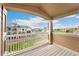 Balcony showing a neighborhood with a walking trail on a sunny day at 7440 S Blackhawk St # 7-303, Englewood, CO 80112