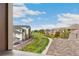 A balcony view showing a neighborhood and a walking trail at 7440 S Blackhawk St # 7-303, Englewood, CO 80112