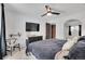 Spacious bedroom with carpet, ceiling fan and dark accents offering a cozy feel at 16193 E Dickenson Pl, Aurora, CO 80013