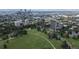 Expansive aerial view of a park with the city skyline in the background on a clear day at 1201 N Williams St # 3B, Denver, CO 80218