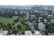 Scenic aerial view showcasing the property's proximity to downtown skyline and adjacent green space at 1201 N Williams St # 3B, Denver, CO 80218