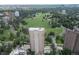 Sweeping aerial view of community with access to park, and a glimpse of outdoor pool at 1201 N Williams St # 3B, Denver, CO 80218
