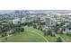 Expansive aerial view of a park with the city skyline in the background on a clear day at 1201 N Williams St # 3B, Denver, CO 80218