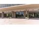 Welcoming building entrance with planters, glass doors, and a covered entryway at 1201 N Williams St # 3B, Denver, CO 80218
