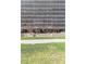 The building entrance features steps and symmetrical landscaping against a wall of glass-fronted balconies at 1201 N Williams St # 3B, Denver, CO 80218