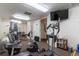 Gym with state-of-the-art exercise equipment and a mounted television for entertainment at 1201 N Williams St # 3B, Denver, CO 80218