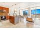 Open-concept kitchen, dining and living area with natural light at 1201 N Williams St # 3B, Denver, CO 80218
