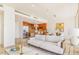 Open-concept living area with modern furnishings and stainless steel appliances at 1201 N Williams St # 3B, Denver, CO 80218