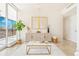 Cozy living area with natural light and a modern sideboard at 1201 N Williams St # 3B, Denver, CO 80218