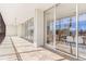 Expansive patio area featuring tiled floors and glass sliding doors, providing seamless indoor-outdoor living at 1201 N Williams St # 3B, Denver, CO 80218