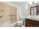 Bathroom featuring shower-tub, tile surround, and vanity at 1037 Wagonwheel Gap Rd, Boulder, CO 80302