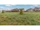 View of backyard with green space at 27639 E 7Th Ln, Aurora, CO 80018