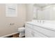Clean and bright bathroom featuring a toilet and white vanity with a white countertop and a sink at 27639 E 7Th Ln, Aurora, CO 80018