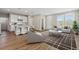 Bright, open living space with hardwood floors, neutral decor, and modern furniture at 27639 E 7Th Ln, Aurora, CO 80018