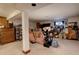 Spacious basement with storage shelves and seating area at 4231 S Fairplay Cir # A, Aurora, CO 80014