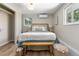 Bedroom featuring ample natural light, a decorative bench, and a comfortable atmosphere at 1120 Hartford Dr, Boulder, CO 80305