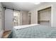 A main bedroom showing a walk-in closet with an adjacent powder room at 1120 Hartford Dr, Boulder, CO 80305
