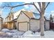 Two-story house with a brick facade and attached garage at 8962 Sunset Ridge Ct, Highlands Ranch, CO 80126