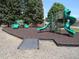 Fun playground with slides and climbing structures, creating a safe and engaging play area for children at 3663 S Sheridan Blvd # O15, Denver, CO 80235
