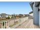 A balcony featuring a wood deck and views of the neighborhood at 9769 E 62Nd Dr, Denver, CO 80238