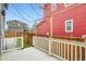 Backyard patio with bistro lighting and nice view of house and yard at 9769 E 62Nd Dr, Denver, CO 80238