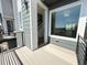 Balcony with a view of a staircase and an open window into the modern home at 2668 W 68Th Ave, Denver, CO 80221