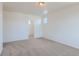 Bedroom features neutral carpet, recessed lighting, and an open closet at 771 Sunflower Dr, Brighton, CO 80601