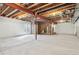 Unfinished basement with exposed beams and open space, offering endless possibilities for customization at 22965 E Bailey Cir, Aurora, CO 80016