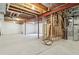 An unfinished basement offers a blank canvas for customization and renovation at 22965 E Bailey Cir, Aurora, CO 80016