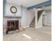 Finished basement with stairs and a charming fireplace that creates a cozy and inviting atmosphere at 3541 E 118Th Ave, Thornton, CO 80233