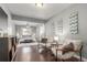 Comfortable bedroom with ceiling fan, sitting area and neutral tones provides relaxation at 3541 E 118Th Ave, Thornton, CO 80233