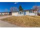 Charming single-story home with a well-maintained lawn and attached two car garage on a sunny day at 3541 E 118Th Ave, Thornton, CO 80233