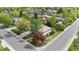 Aerial view of a two-story home showcasing mature trees, lawn, and neighborhood at 172 S Forest St, Denver, CO 80246