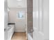 Bright bathroom featuring double sink vanity with gray countertop and stylish tile flooring at 172 S Forest St, Denver, CO 80246