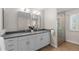Double sink bathroom with quartz countertop and modern fixtures at 172 S Forest St, Denver, CO 80246