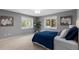 Comfortable bedroom with plush carpet, natural light, and neutral decor at 172 S Forest St, Denver, CO 80246
