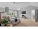 Large bedroom with bright light, ceiling fan, carpeted floor and a TV at 172 S Forest St, Denver, CO 80246
