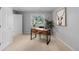 The bedroom features a stylish work area with a wooden desk, black chair, and a large window for natural light at 172 S Forest St, Denver, CO 80246