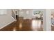 Elegant entryway with hardwood floors, natural light, and staircase at 172 S Forest St, Denver, CO 80246